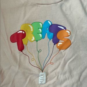 Kith t shirt.  This shirt has a pink cast too it. It is not white